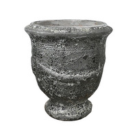 The Seafoam French Urn Dark Grey 60x67cm L is a round, textured planter pot with a flared rim and narrow base, shown against a white background.