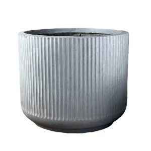 A round, light grey planter with vertical ridges and a slightly tapered base, set against a white background.