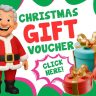 Cartoon Santa holds vouchers near text reading "Christmas Gift Voucher," with a Free Weeping Cherry Tree offer among wrapped gifts and a "Sale Ended" tag on a green snowflake background.