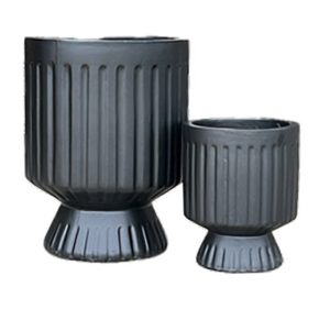 A Balmoral Raised Cylinder Black planter (27x33cm) with a ribbed design and pedestal base is displayed on a plain white background.